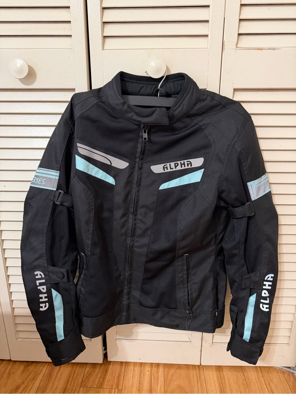 ALPHA ladies Black Motorcycle Jacket with Light Blue Accents